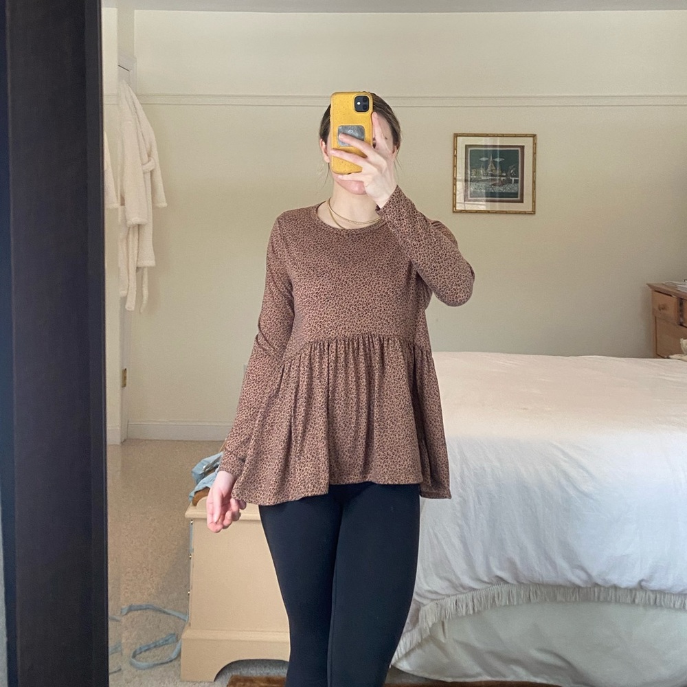 Cheetah print long sleeve peplum top